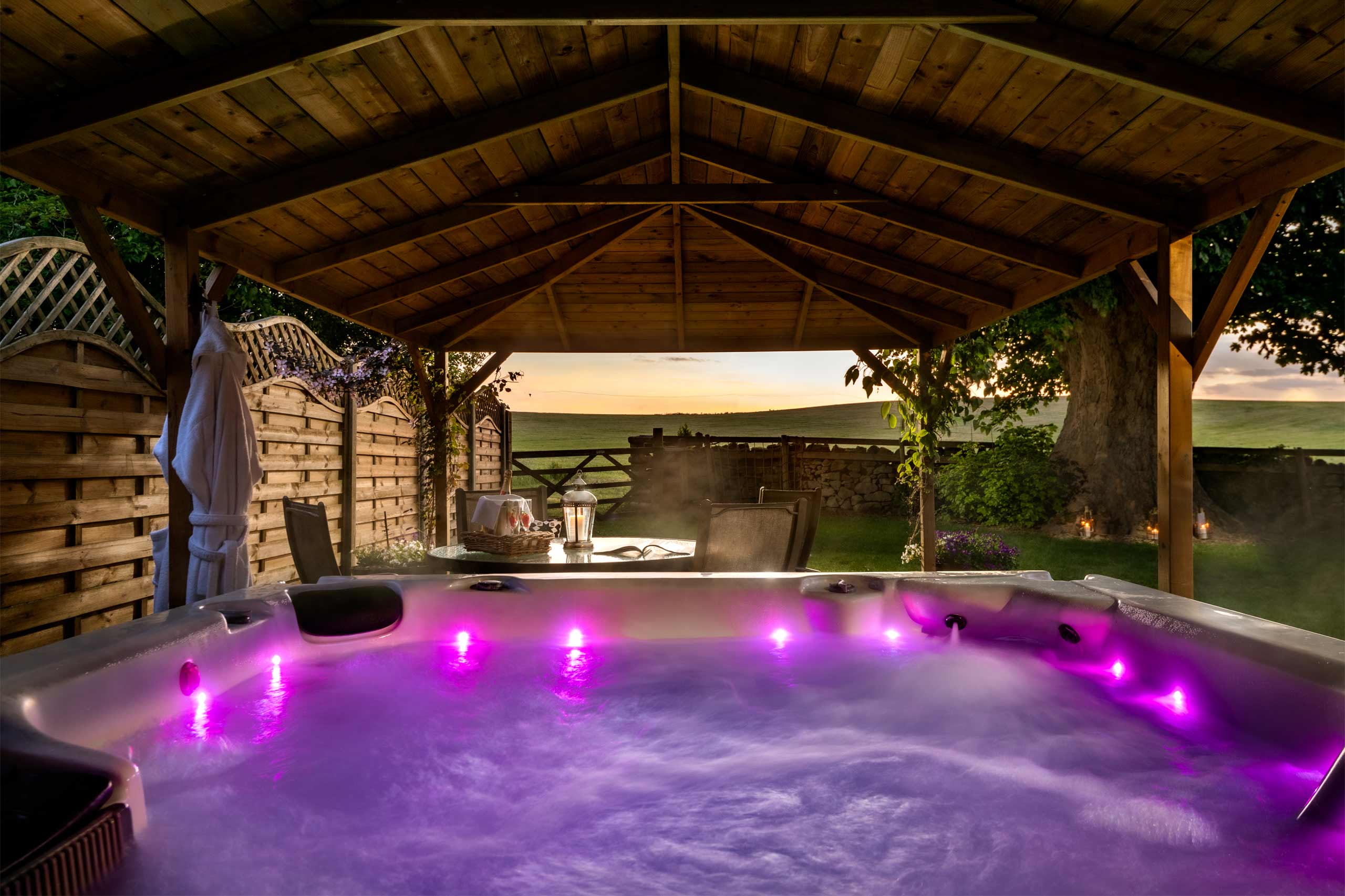 Luxury family friendly bed and breakfast - Sycamore Spa Suite Hot Tub at dusk